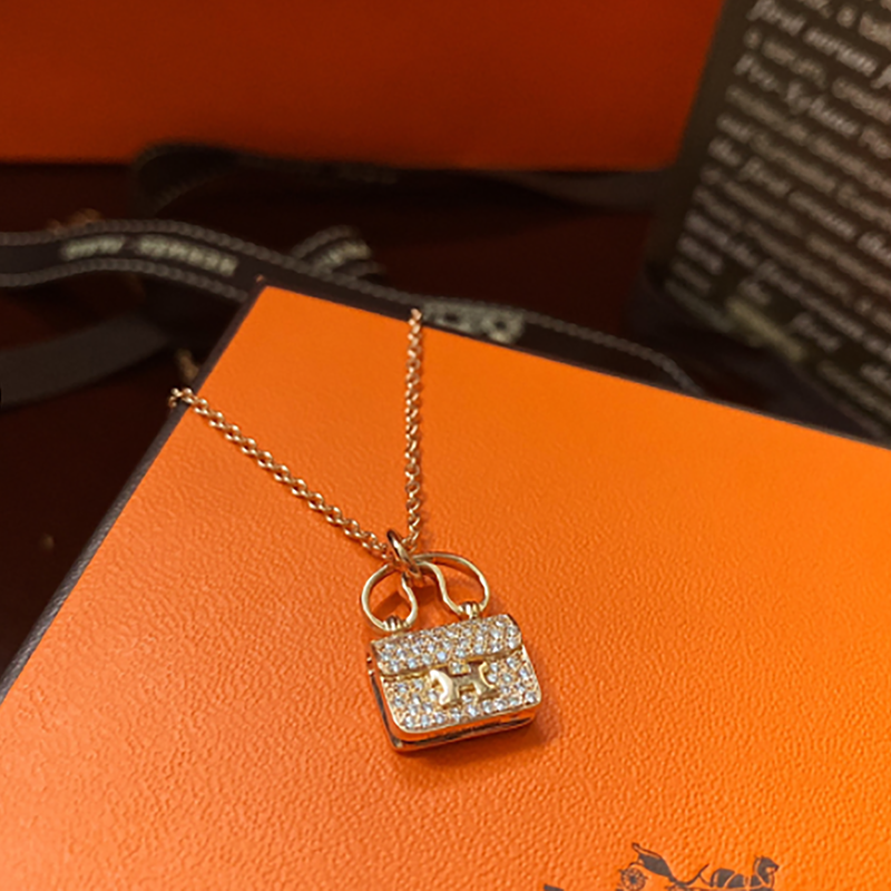 Hermes diamond constance amulette pendant